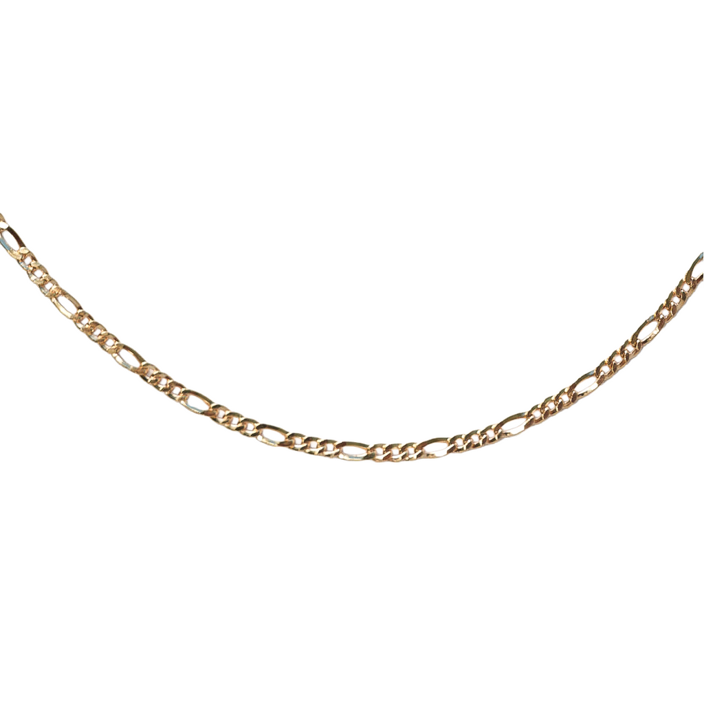 senoe 10K yellow gold Figaro chain necklace on a white background