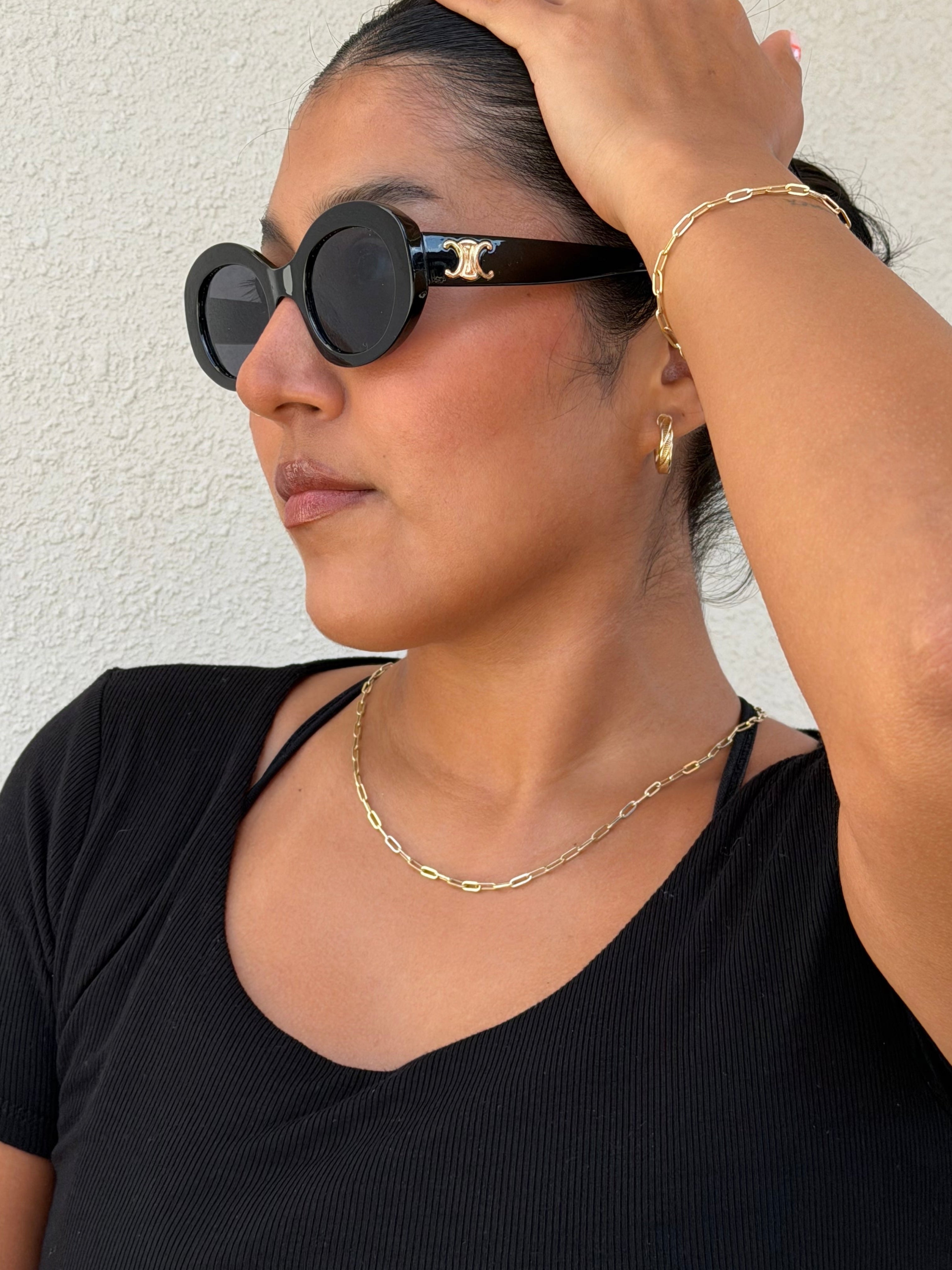 model wearing the senoe 10k yellow gold paperclip chain 