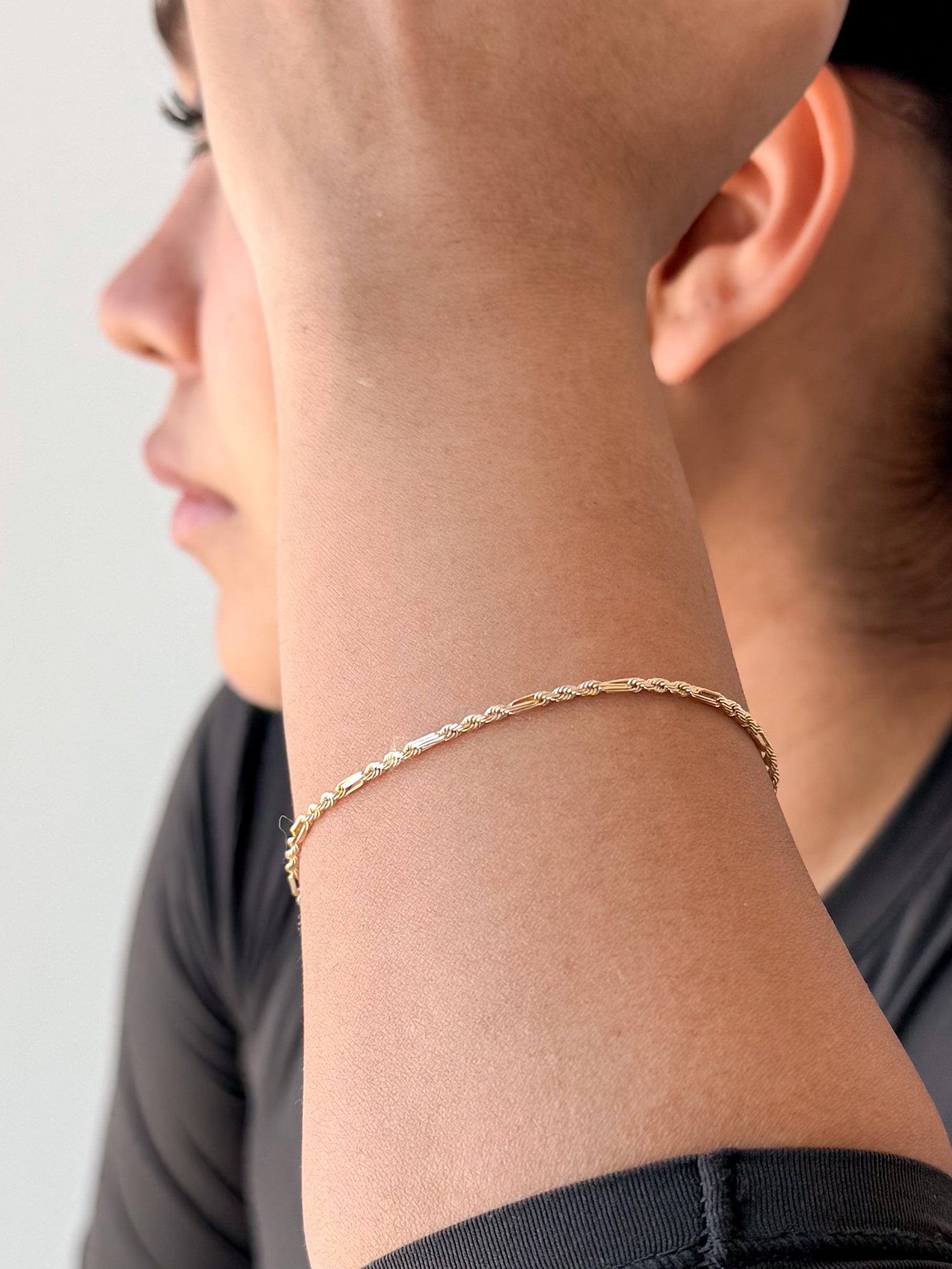 senoe 10k yellow gold textured chain bracelet worn on the wrist 