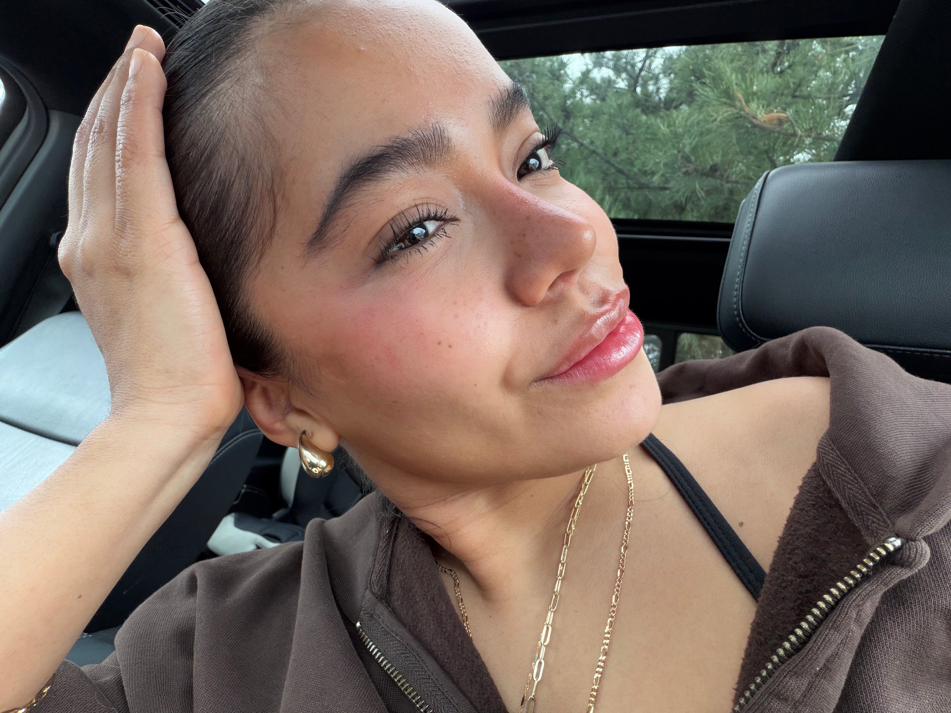 founder of senoe wearing everyday solid gold jewelry